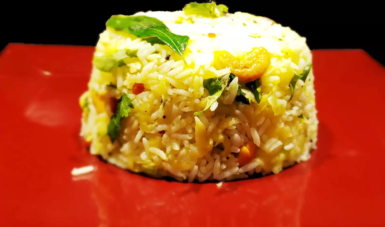A must try raw mango rice served in a plate