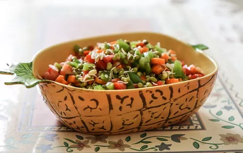 A bowl of tasty & healthy sprout veggie salad recipe