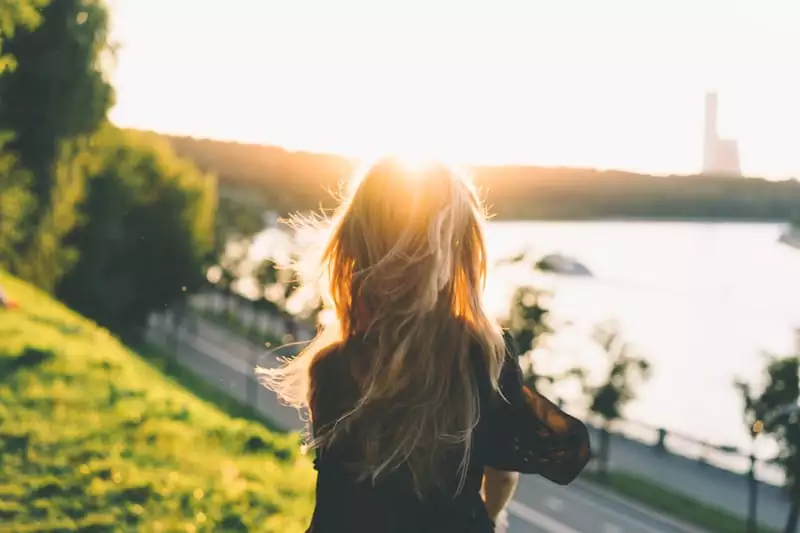 Woman enjoying Sunrise